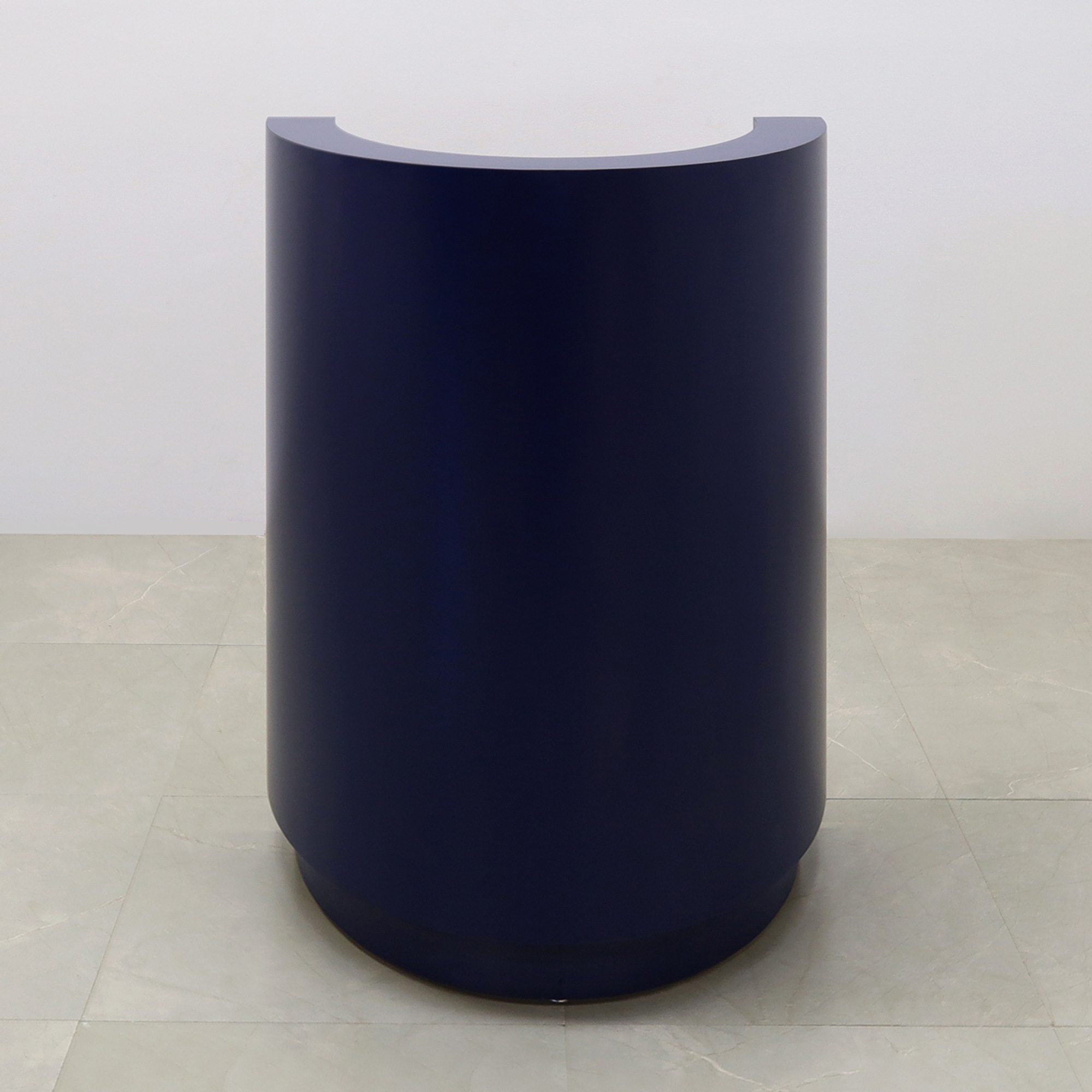 32-inch Lima Round Podium & Host Custom Desk in navy blue matte laminate desk and toe-kick, shown here.