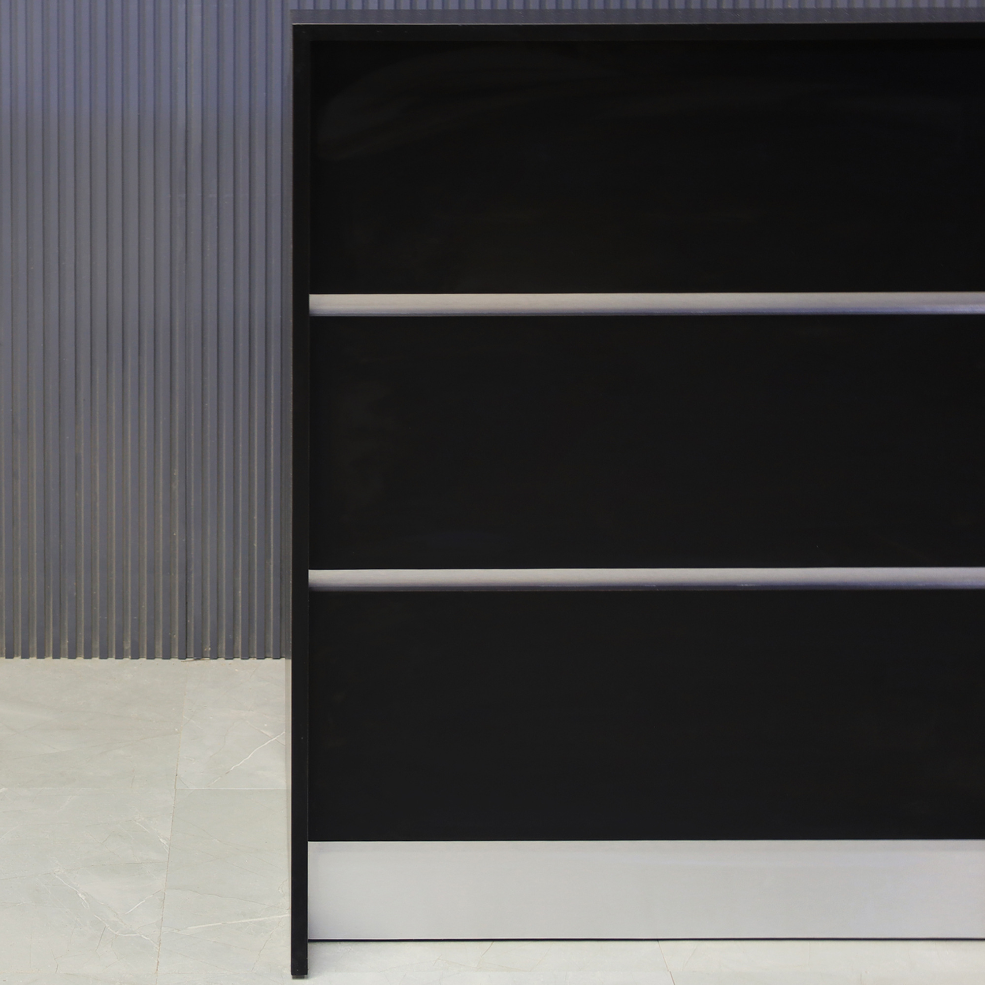 36-inch New Jersey Podium & Host Custom Reception Desk in black matte laminate main desk and front panels and brushed aluminum accent & toe-kick, shown here.