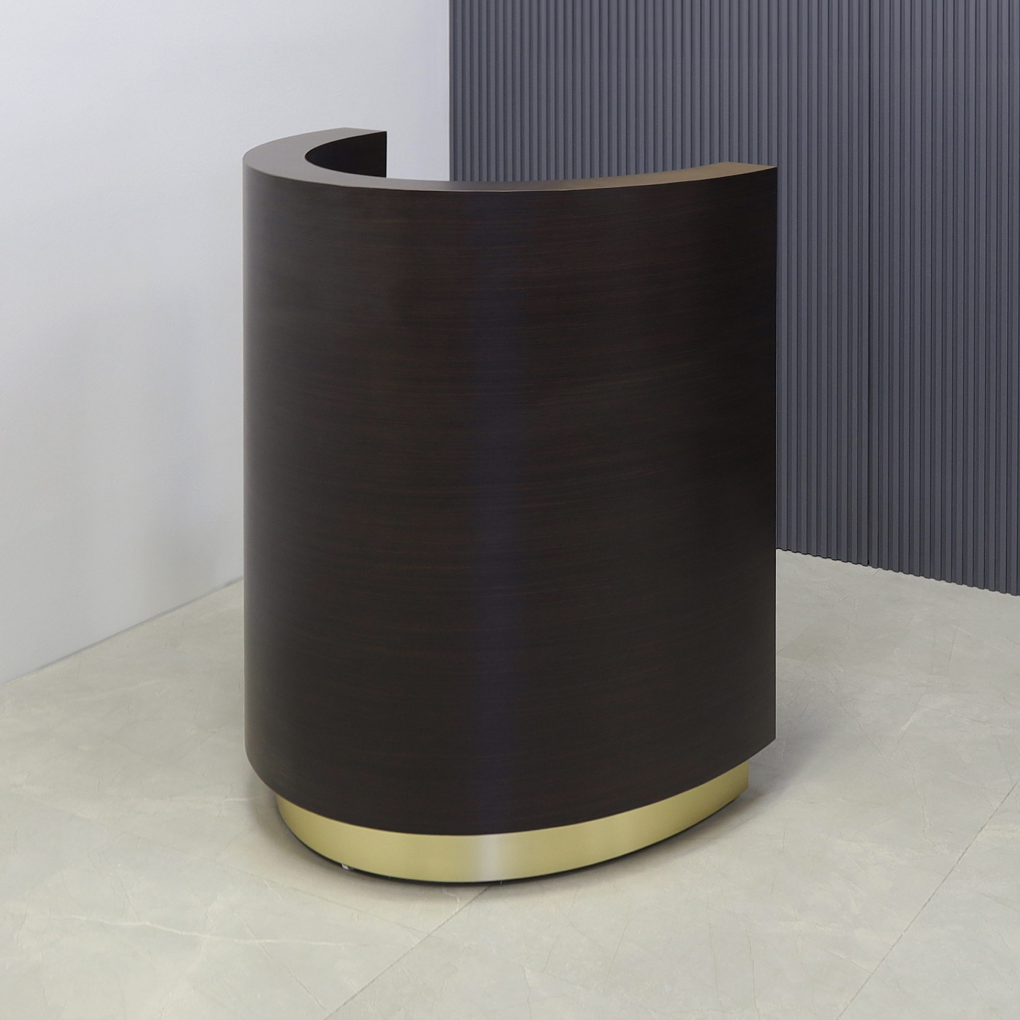 32-inch Lima Round Podium & Host Custom Desk in ebony recon matte laminate desk and gold aluminum toe-kick, shown here.
