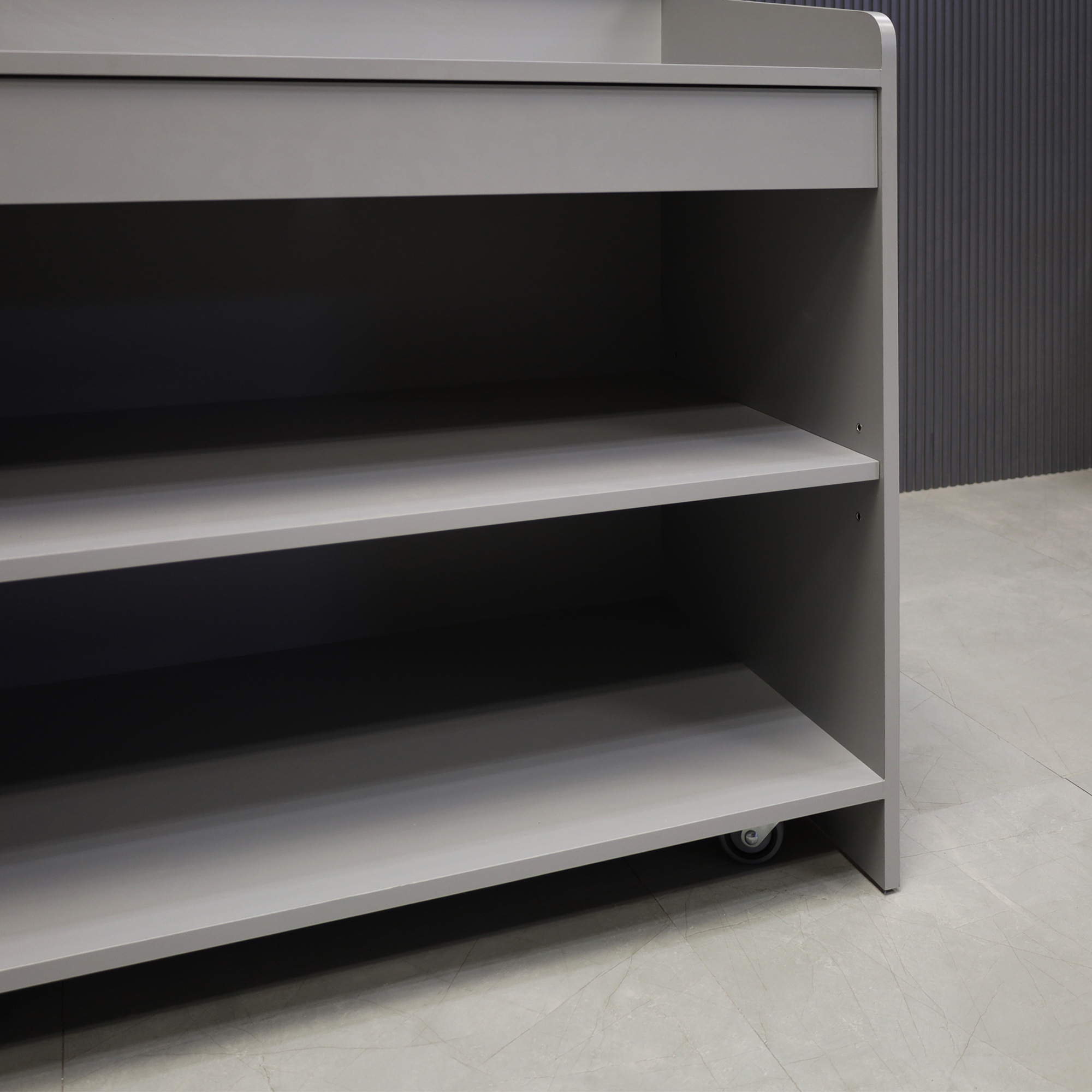 42-inch New Jersey Podium & Host Custom Reception Desk in fog gray matte laminate main desk and white acrylic front panels, shown here.